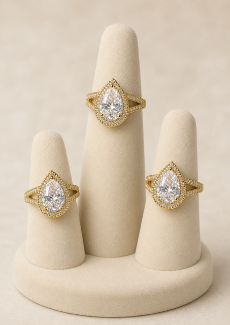 Pear Shape Moissanite Halo Ring in Gold