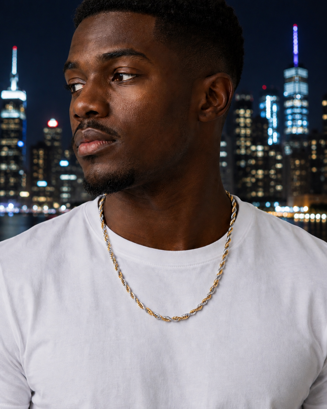 Man wearing a gold chain necklace with a city skyline in the background
