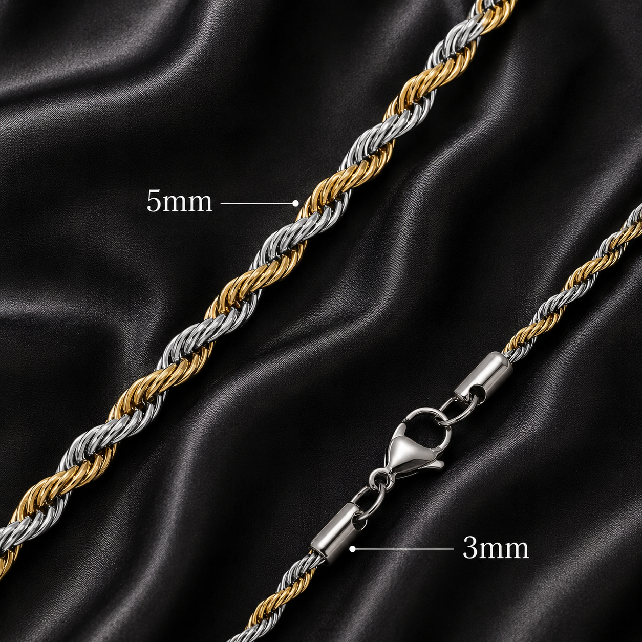 Two gold and silver chains on a black satin background with measurements indicated.