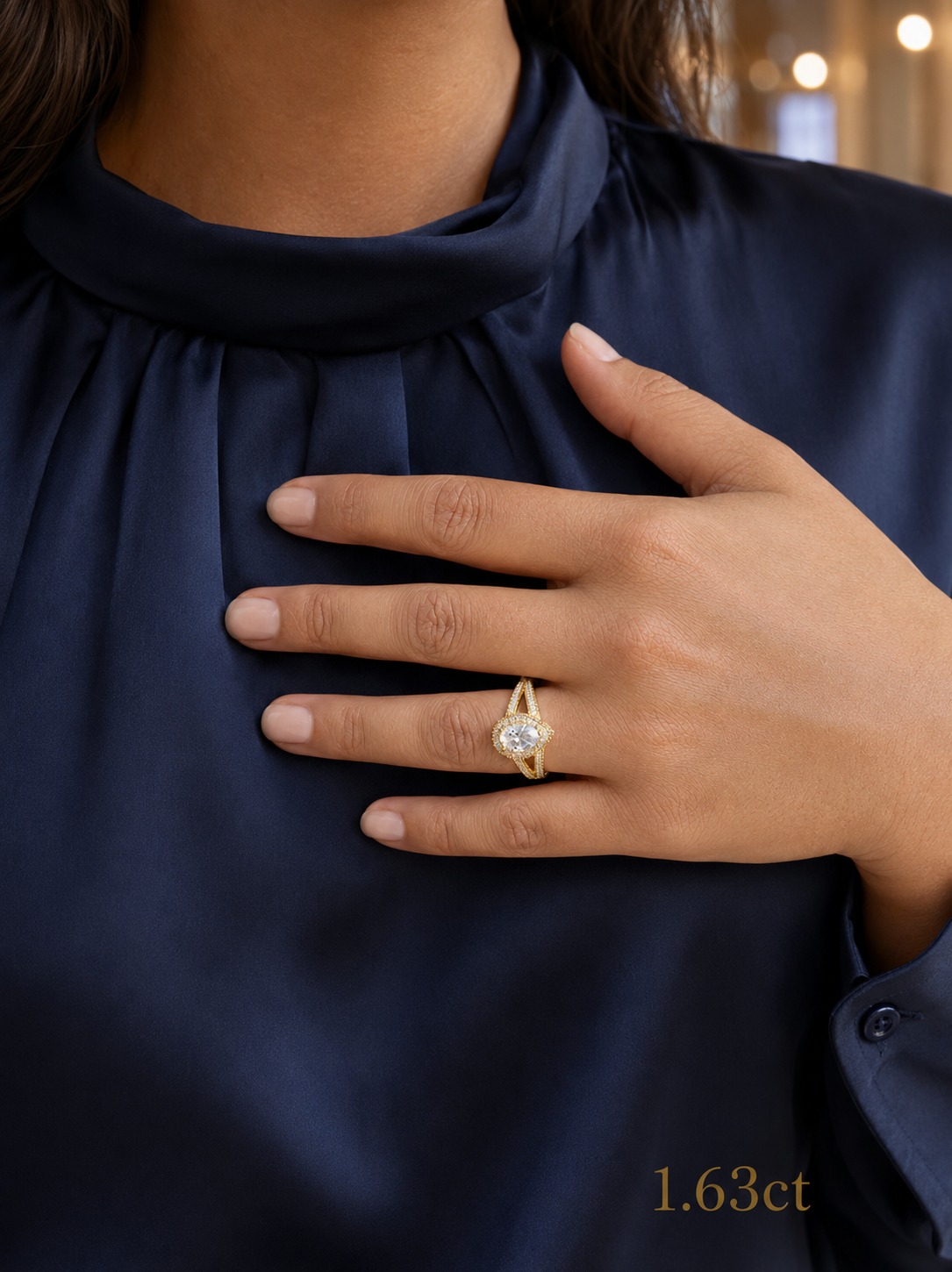 Pear Shape Moissanite Halo Ring in Gold