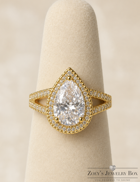 Pear Shape Moissanite Halo Ring in Gold