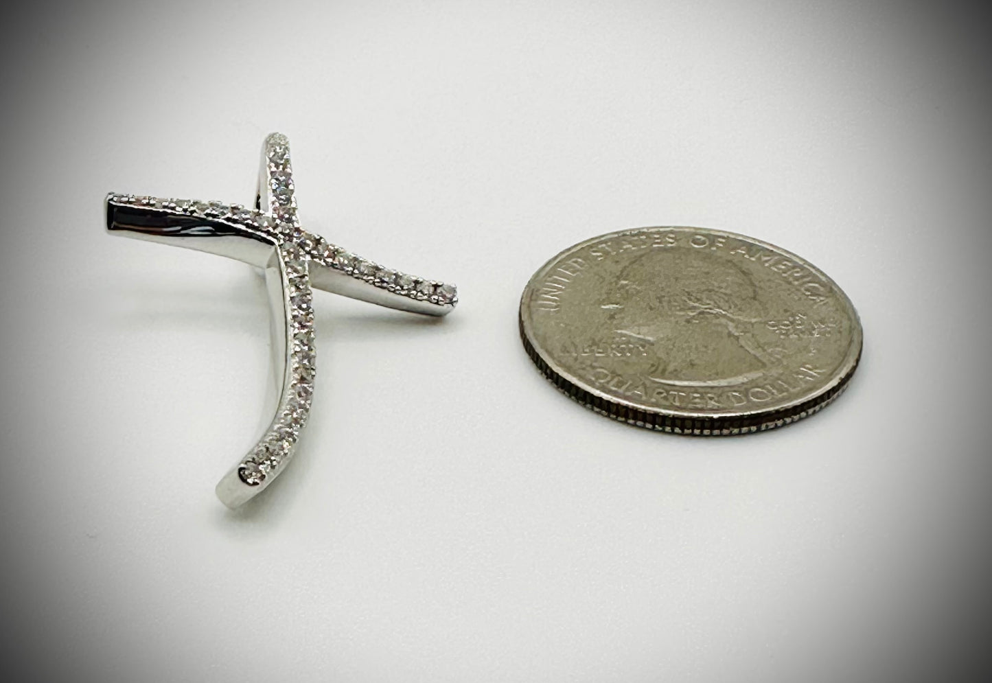 Rhodium Curvy Cross Pendant – Twisted Iced Out Cross