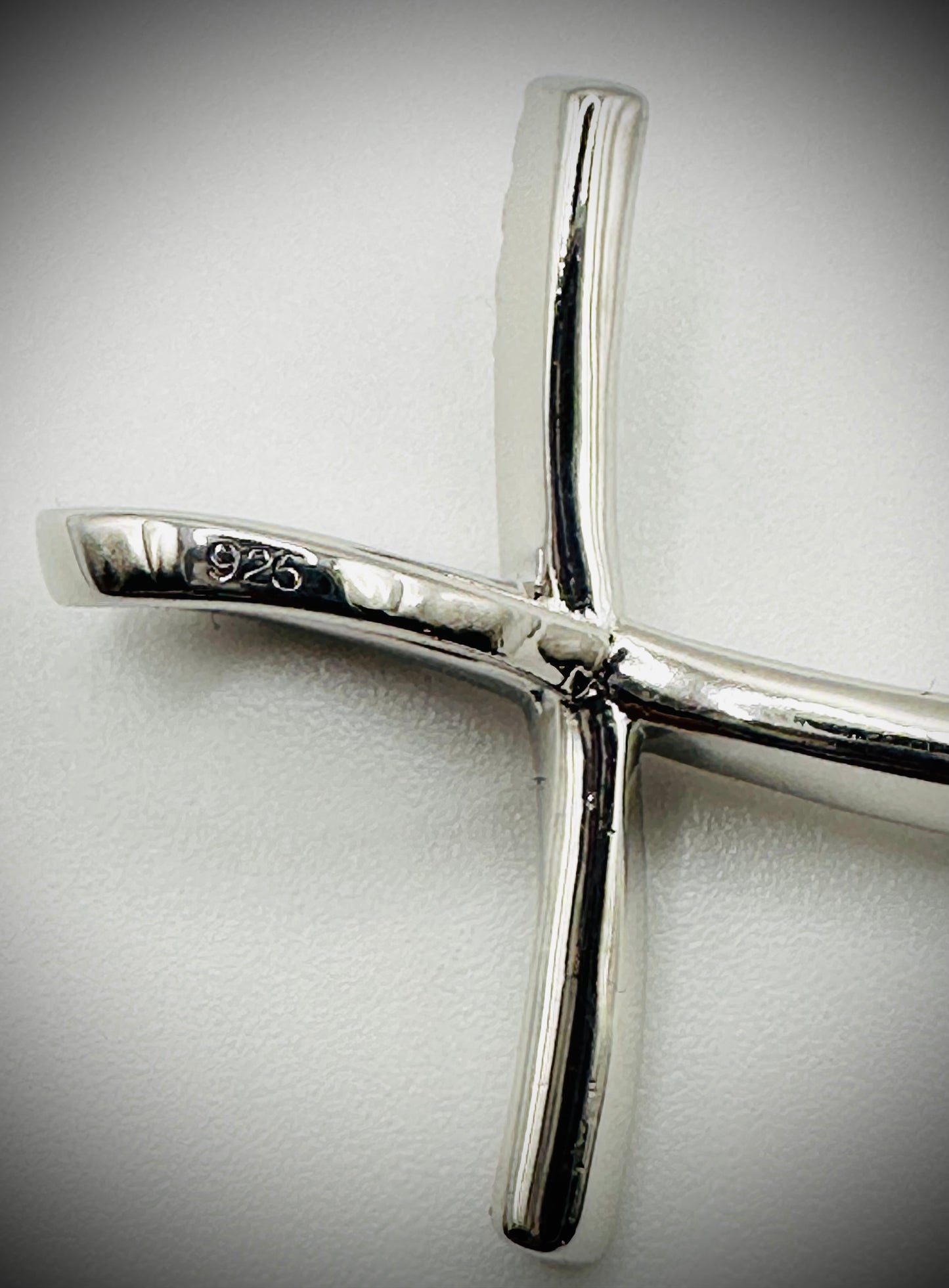 Rhodium Curvy Cross Pendant – Twisted Iced Out Cross